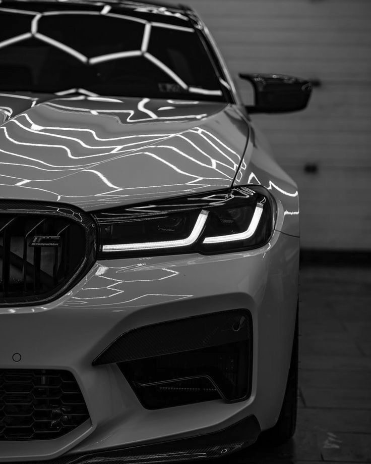 Crystal-clear restored headlight lens on a BMW M5